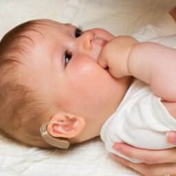 Baby with hearing aid