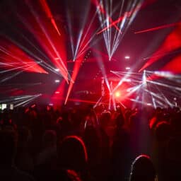 Audience cheering at concert and a party